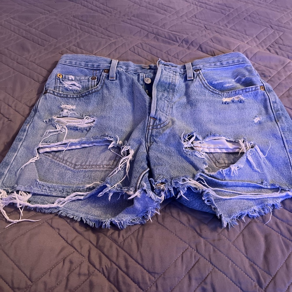 Levi’s  501 Distressed Light Blue Denim Cutoff Shorts